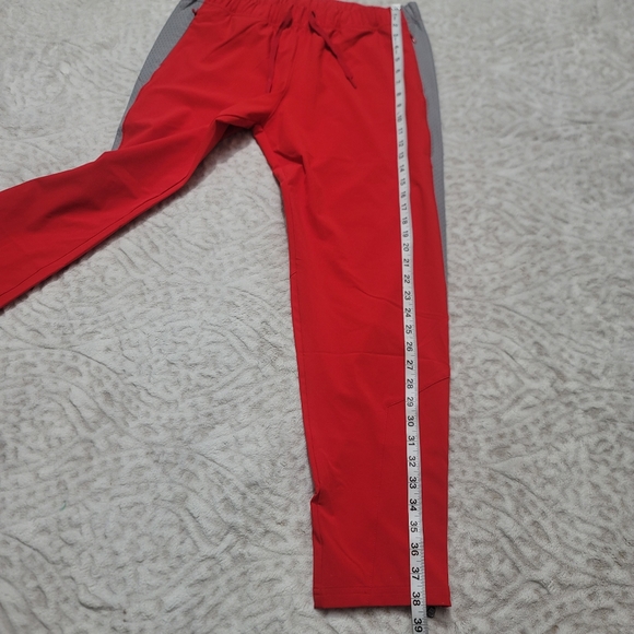 Under Armour Women's Woven Warm Up Pants Size  M‎ Red/gray NWT - Picture 14 of 16